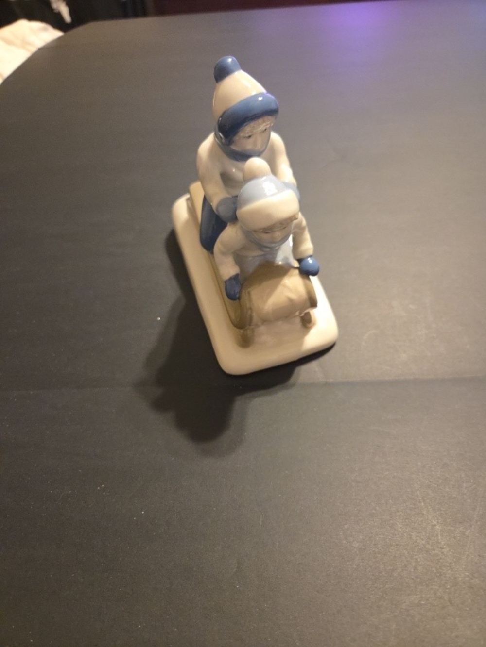 VTG Blue and Cream Ceramic Sledding Children Figurine - Holiday Tabletop Decor